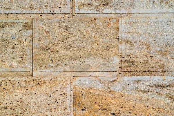 Superfície texturizada de uma parede de pedra — Fotografia de Stock