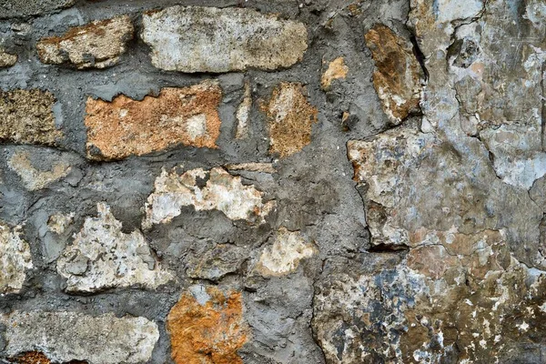 Abstrakte Steinstruktur eines Teils der Mauer — Stockfoto