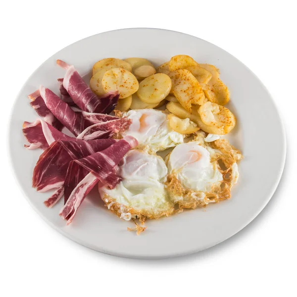 Assiette d'œufs cassés avec jambon et pommes de terre . — Photo