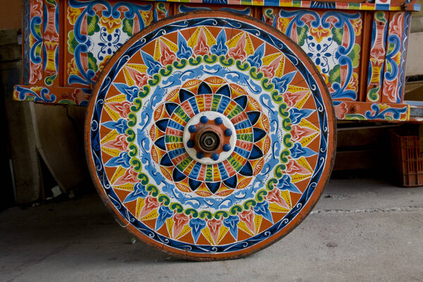 Close-up of a cart mosaic wheel