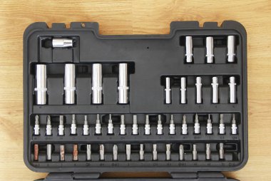 a set of metal tools for screwdrivers and nozzles for repair and installation