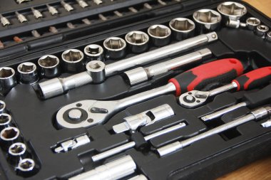 a set of metal tools for screwdrivers and nozzles for repair and installation