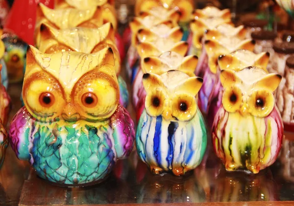 multi-colored ceramic bird figures to decorate the a house