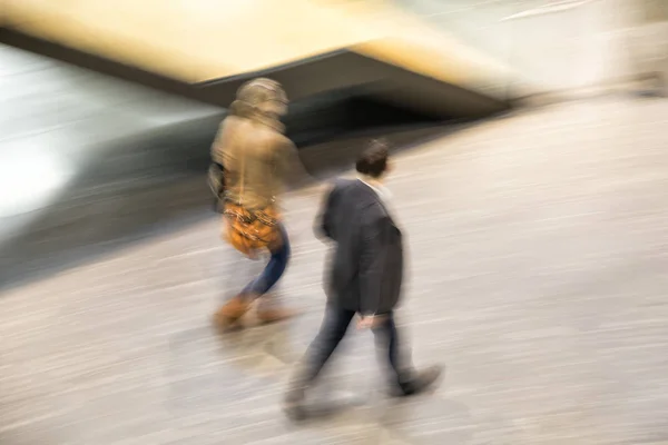 Intentional blurred image of people walking — Stock Photo, Image