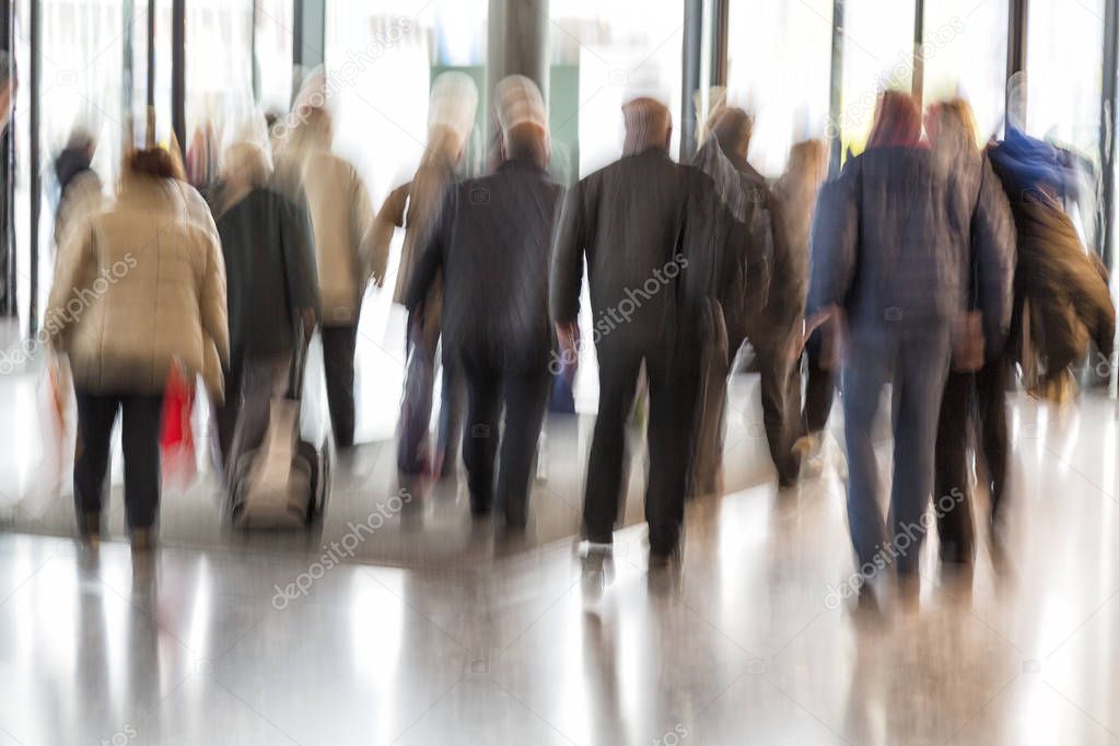 Intentional blurred image of people walking