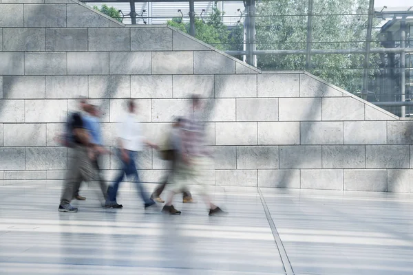 Large group of business people walking — Stock Photo, Image