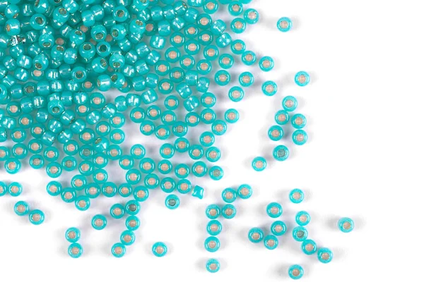 Isolated beads on a white background, scattered beads