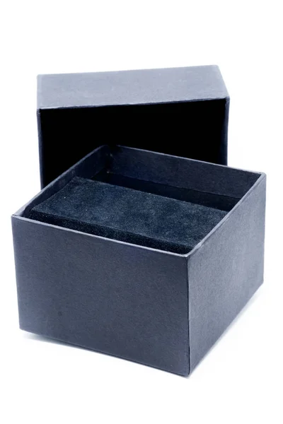 Caja negra sobre fondo blanco. —  Fotos de Stock