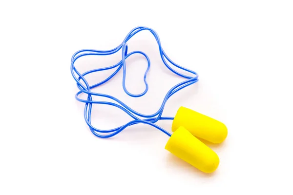 Gele oordoppen met blauwe band. — Stockfoto