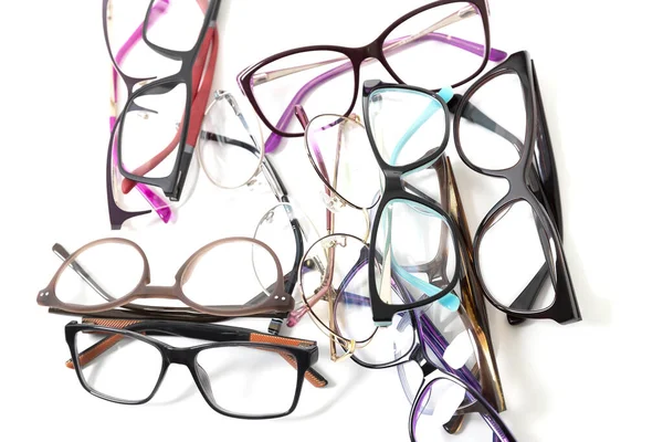 Muitos Óculos Moda Plástico Espalhados Isolados — Fotografia de Stock