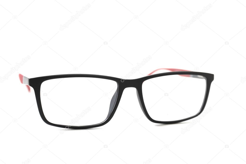 Plastic eyeglass frame with red inserts. Isolated