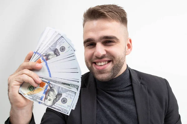 Close-up of a happy guy getting paid for work