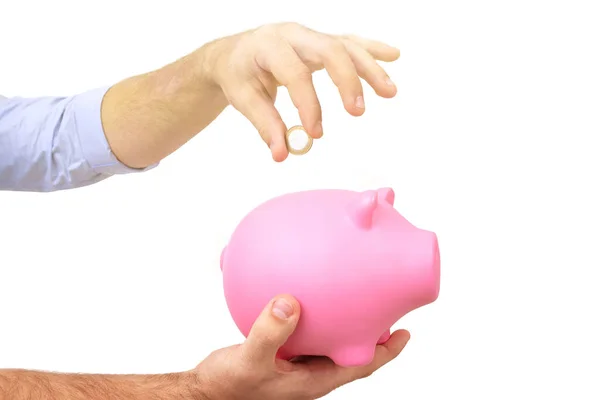 Guy Blue Shirt Throws Coin Pink Piggy Bank Toned — Stock Photo, Image