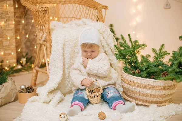 Cute Little Girl White Knitted Sweater Sits White Plaid Home — Stock Photo, Image