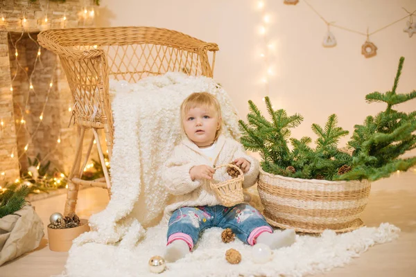 Cute Little Girl White Knitted Sweater Sits White Plaid Home — Stock Photo, Image