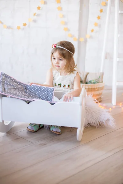 Little Cute Girl White Dress Plays Doll Bed Bright Children — Stock Photo, Image