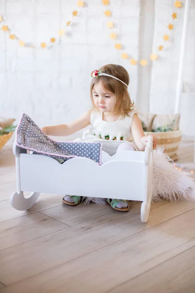 Little Cute Girl White Dress Plays Doll Bed Bright Children — Stock Photo, Image