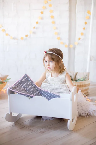 Little Cute Girl White Dress Plays Doll Bed Bright Children — Stock Photo, Image