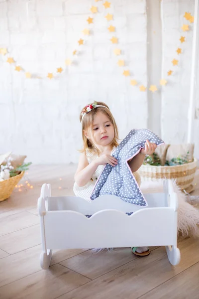 Little Cute Girl White Dress Plays Doll Bed Bright Children — Stock Photo, Image