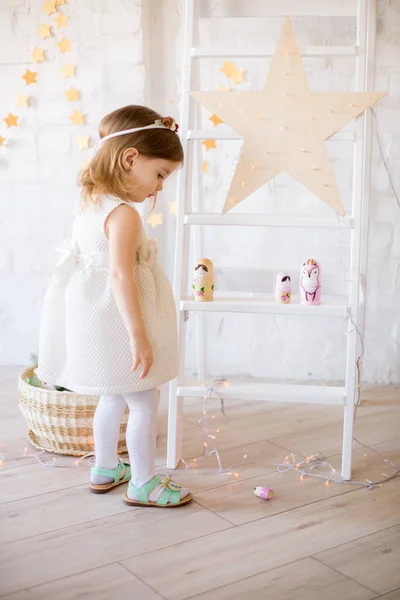 Little Cute Girl White Dress Plays Bright Children Room Decorated — Stock Photo, Image