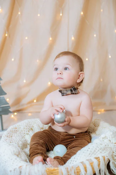 Little Cute Kid Suspenders Bow Tie Sits Basket Decorated Needles — Stock Photo, Image