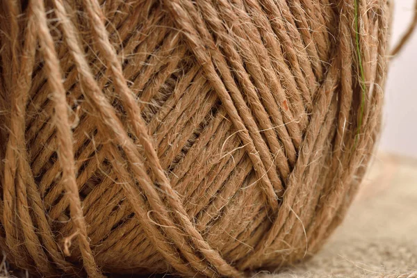 Close up of hank of twine, reel of rope, ball of hemp thread on — Stock Photo, Image