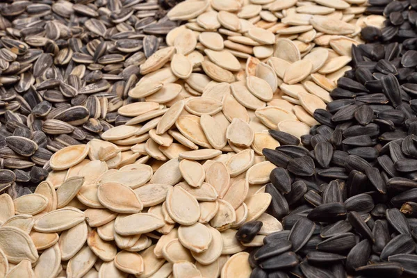 Macro image of different sunflower and pumpkin seeds. Health. Se