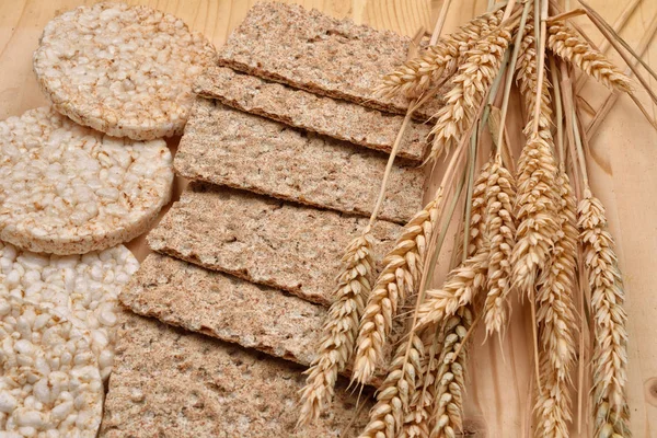 Stack of different kinds of products made from wheat expanded wh — Stock Photo, Image