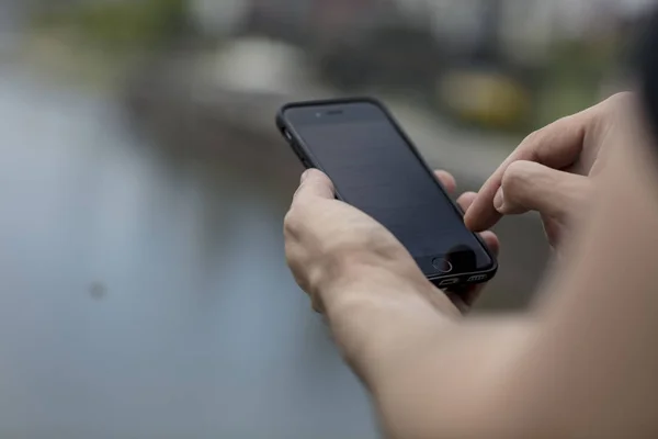 Outdoor Mobile Phone in Male Hands — Stock Photo, Image