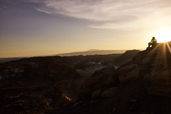 Silhouette of a Man on Atacama Desert Cliff