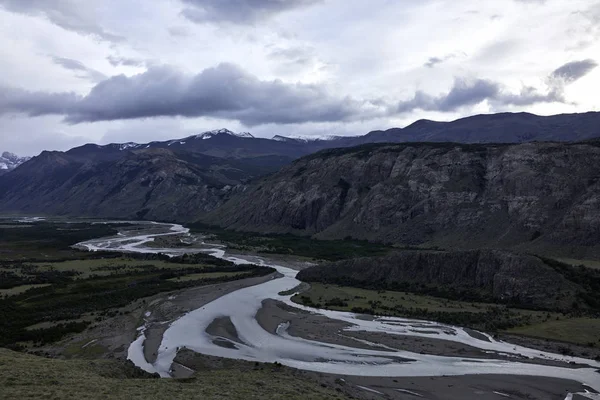 Patagonian Landscape: River and Mountain Range