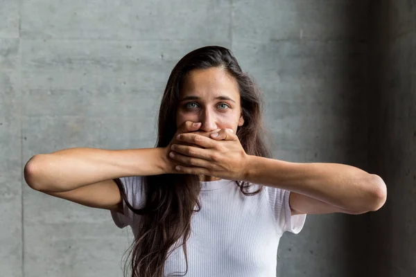 Young Woman Covering Mouth with Hands — Stock Photo, Image