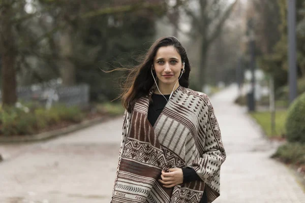 Beautiful Middle Eastern Woman Wearing Poncho Posing Outdoors — Stock Photo, Image