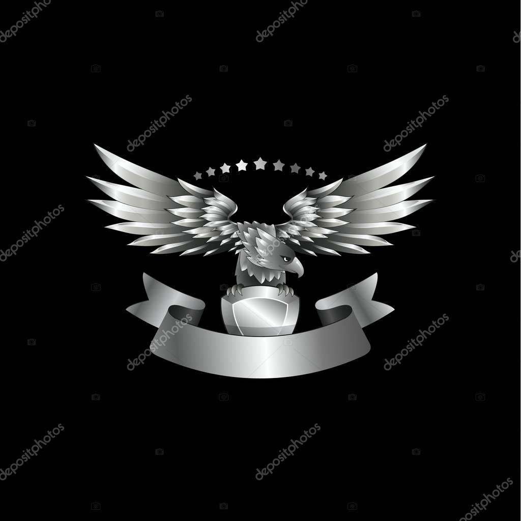 Chrome metal Eagle emblem with ribbon. Heraldic eagle with spread wings template and the jewel in its claws.