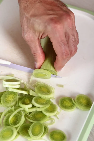 Slicing Leek. Making Chicken, Cheese and Leek Parcel Series.