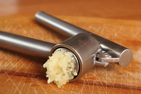 Garlic crushed with garlic press