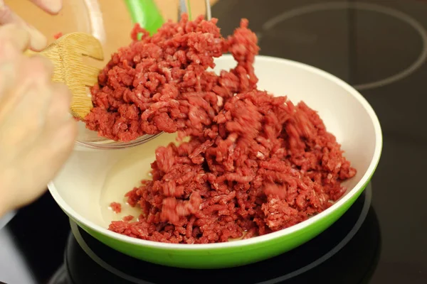 Making enchilada tortilla with beef. Series.