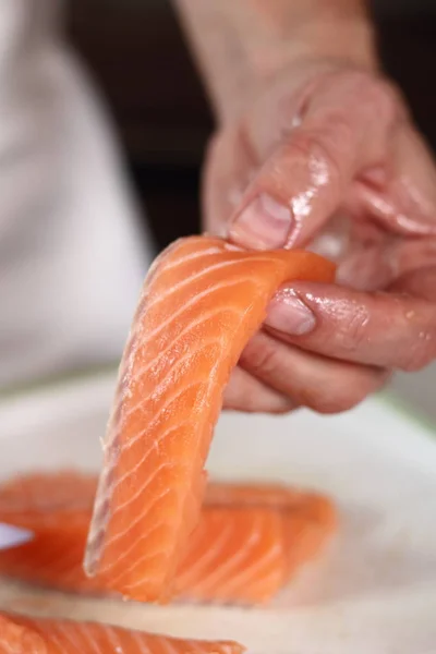 Strip of Salmon Fillet. Making Salmon in Puff Pastry Series.
