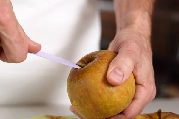 Removing core of apple. Making Filo Pastry Topped Apple Pie Series.