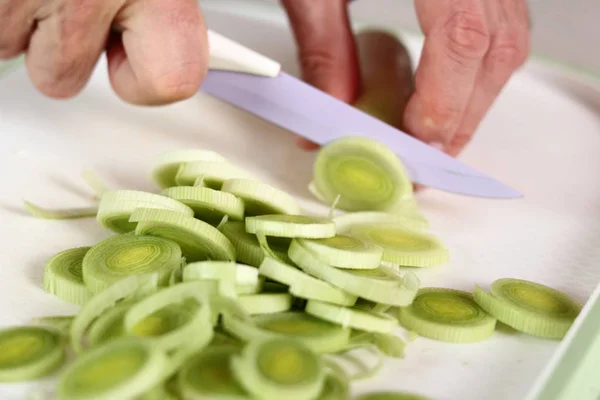 Slicing Leek. Making Chicken, Cheese and Leek Parcel Series.