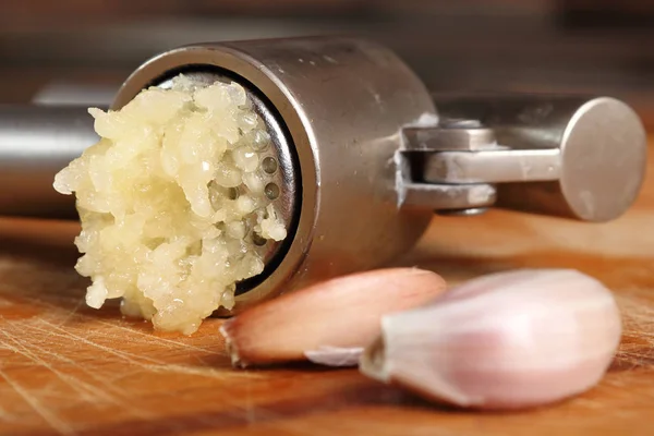 Garlic crushed with garlic press