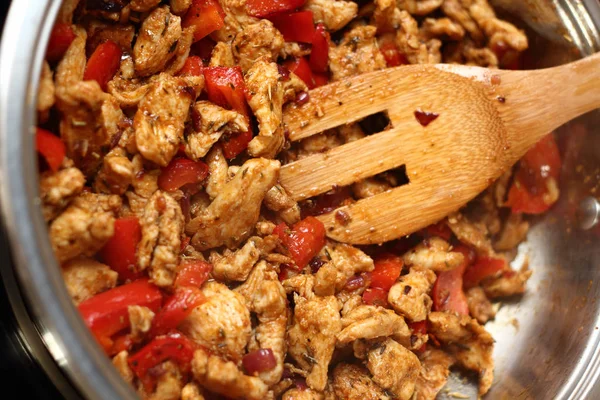 Frying Chicken and Pepper. Series - making tortilla with chicken and bell pepper.