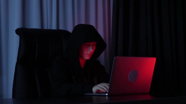 Female hacker programming on laptop and breaking password. coding on screen. Female web developer typing script on computer. Hacker typing on laptop keyboard. Security social protection concept — Stock Video