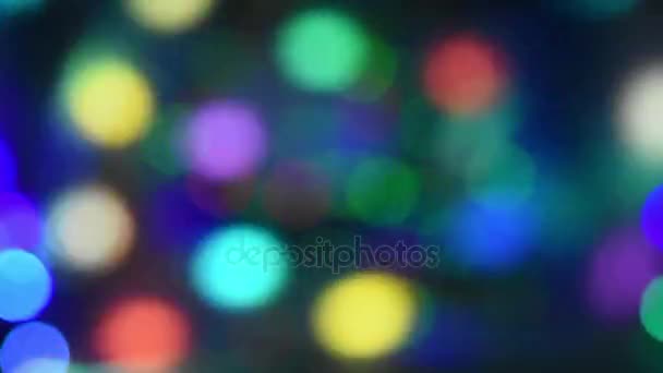 Fond abstrait des cercles lumineux colorés en mouvement 