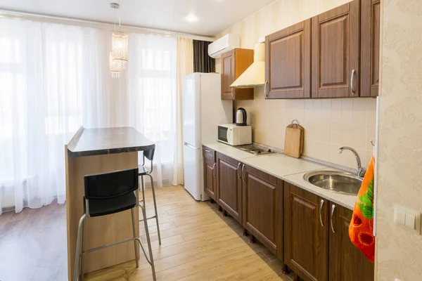 Kitchen interior with a bar counter in the apartment — Stock Photo, Image