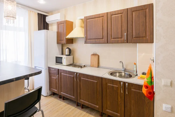 Interior of a modern spacious inexpensive kitchen — Stock Photo, Image