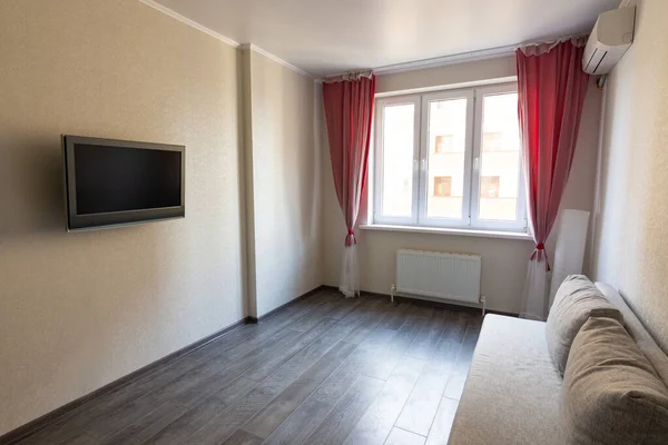 Interior of a modest room in an apartment for rent — Stock Photo, Image