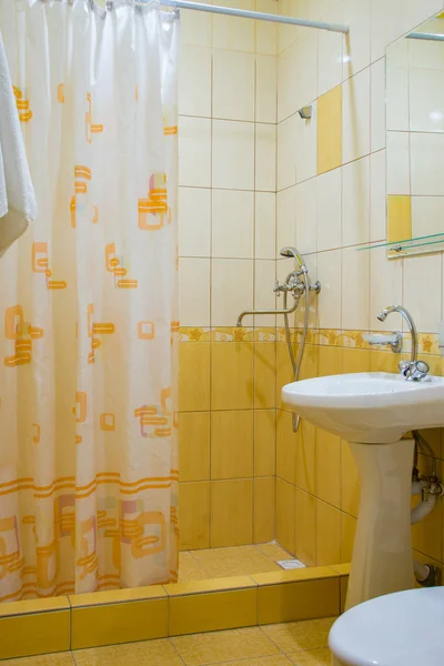 Hotel bathroom, shower, washstand and toilet — Stock Photo, Image