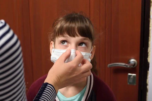 Mom Corrects Protective Medical Mask Face Child — Stock Photo, Image