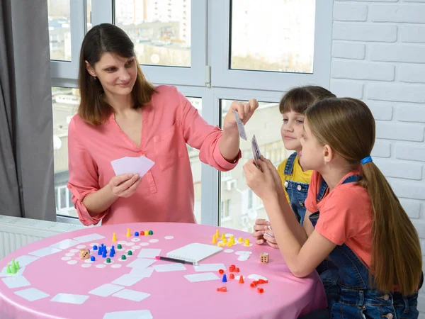 Girl Picks Card Pile Daughter Cards Board Game — Stock Photo, Image